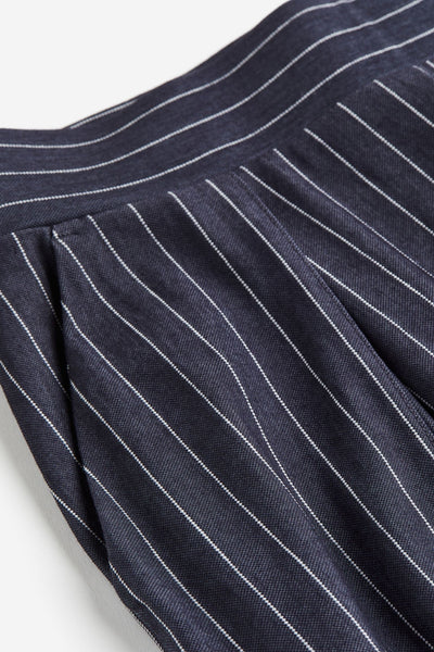 Luftig damebukser med bredt snit og folder Bukser Dame